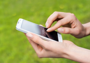 Young adult using mobile smart phone