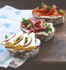 Appetizers with cheese,prosciutto and smoked salmon