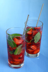 Cocktail with fresh strawberries and mint