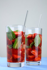 Cocktail with fresh strawberries and mint