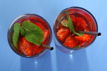 Cocktail with fresh strawberries and mint