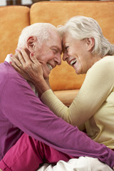 Romantic Senior Couple Relaxing At Home