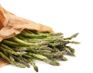 Asparagus in a paper bag, isolated.