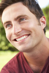 Obraz premium Head And Shoulders Portrait Of Smiling Man