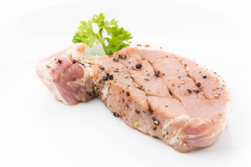 raw meat pork steak with black peppers