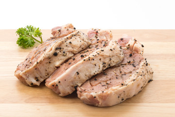 raw meat pork steak with black peppers