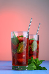 Cocktail with fresh strawberries and mint