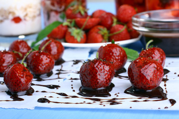 A tray of freshly dipped chocolate covered strawberries