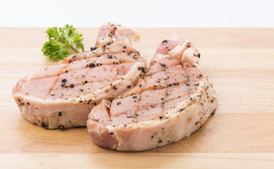 raw meat pork steak with black peppers