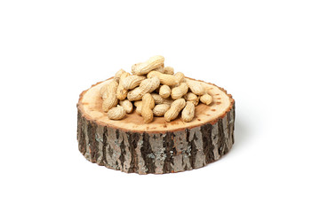 Pile of unshelled peanuts, isolated on white background