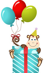 Obraz na płótnie Canvas Birthday monkey on gift box