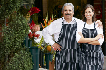 Portrait Of Male And Female Florist Outside Shop