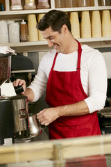 Man Making Coffee In Shop