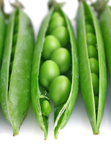 fresh green peas isolated on a white background