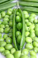 fresh green peas isolated on a white background