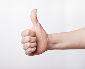 Approval thumbs up like sign as  hand gesture isolated over whit