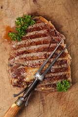 beef steak with vintage meat fork