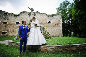 Young wedding couple in love on their wedding day