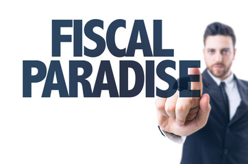 Business man pointing the text: Fiscal Paradise