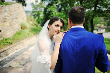 Young wedding couple in love on their wedding day
