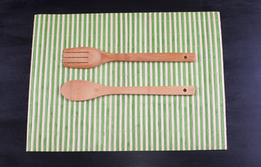 Wooden fork and spoon on wood