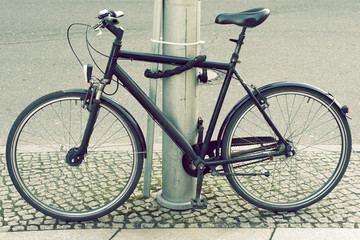 Obraz na płótnie Canvas locked bicycle
