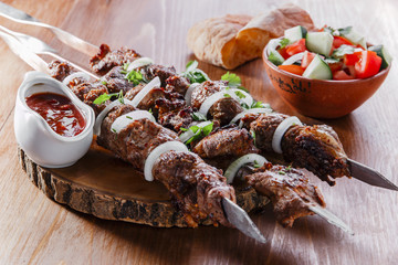 skewers shashlik kebab  with red sauce