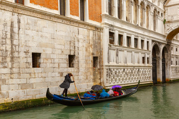 Fototapeta na wymiar Venice gondola in rainy weather, Italy