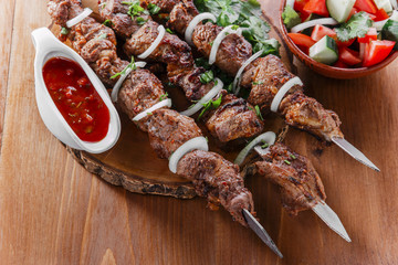 skewers shashlik kebab  with red sauce