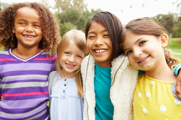 Obraz premium Group Of Young Girls Hanging Out In Park Together