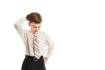 Boy with a necktie thoughtful isolated