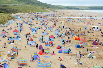 Tourists on beach in summer