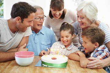 Multi Generation Family Celebrating Daughter's Birthday