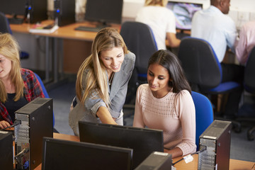 College Students At Computers In Technology Class