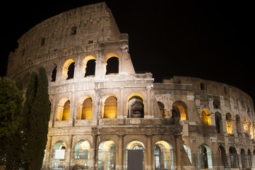 Fototapeta na wymiar Roman Coliseum at night in Rome, Italy