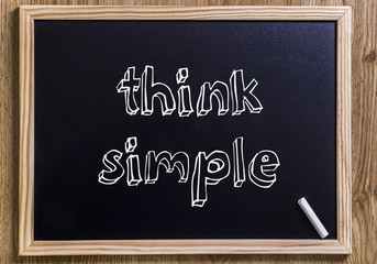 Chalkboard with text "think simple"
