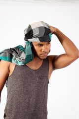 Black man wearing an Arabic head scarf