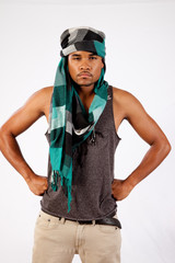 Black man wearing an Arabic head scarf