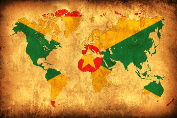 The flag of Grenada in the outline of the world map