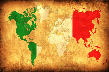 The flag of Italy in the outline of the world map