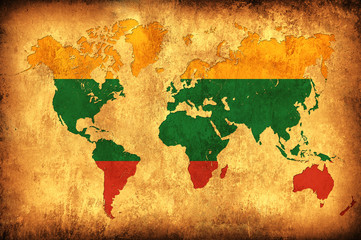 The flag of Lithuania in the outline of the world map