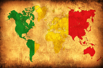 The flag of Mali in the outline of the world map