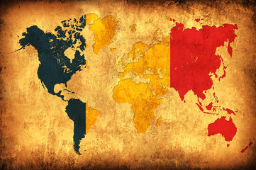 The flag of Romania in the outline of the world map