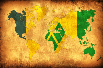 The flag of Saint Vincent Grenadines in the outline of the world