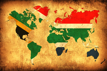 The flag of South Africa in the outline of the world map