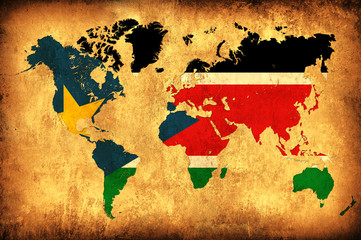 The flag of South Sudan in the outline of the world map