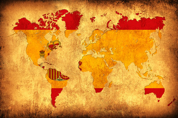 The flag of Spain in the outline of the world map