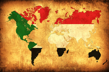 The flag of Sudan in the outline of the world map