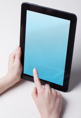 tablet pc with a blank screen in the hands. Business, technology