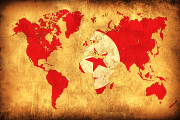 The flag of Tunisia in the outline of the world map